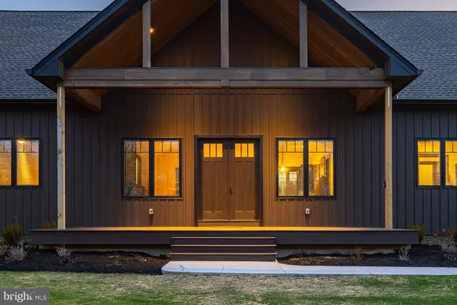a view of front door with yard