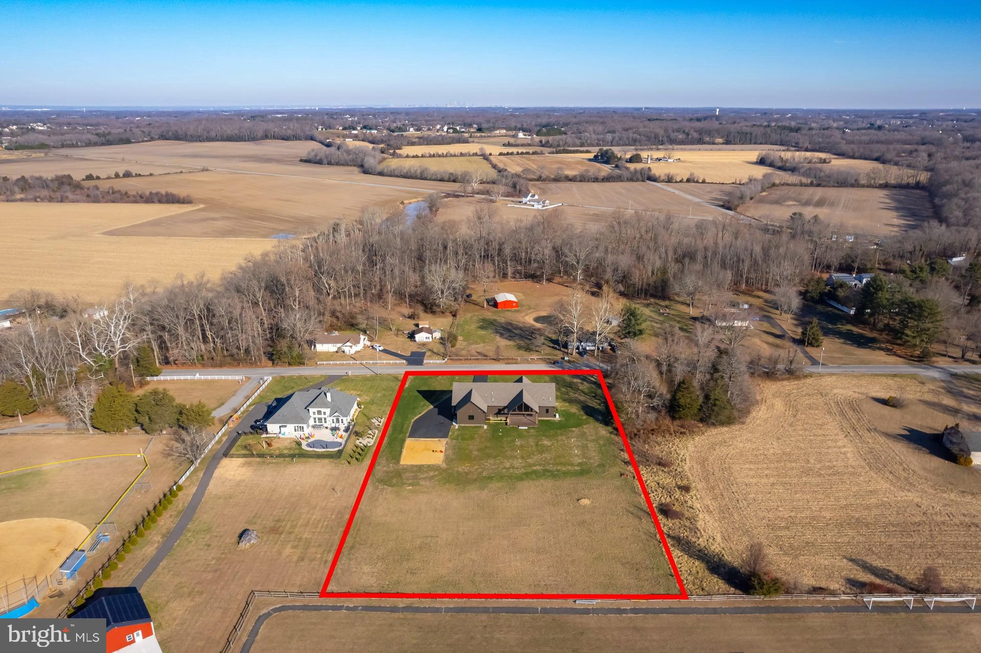 75 Ferrell Road Mullica Hill, NJ 08062 - Photo 41 of 42 an aerial view of a house with a swimming pool