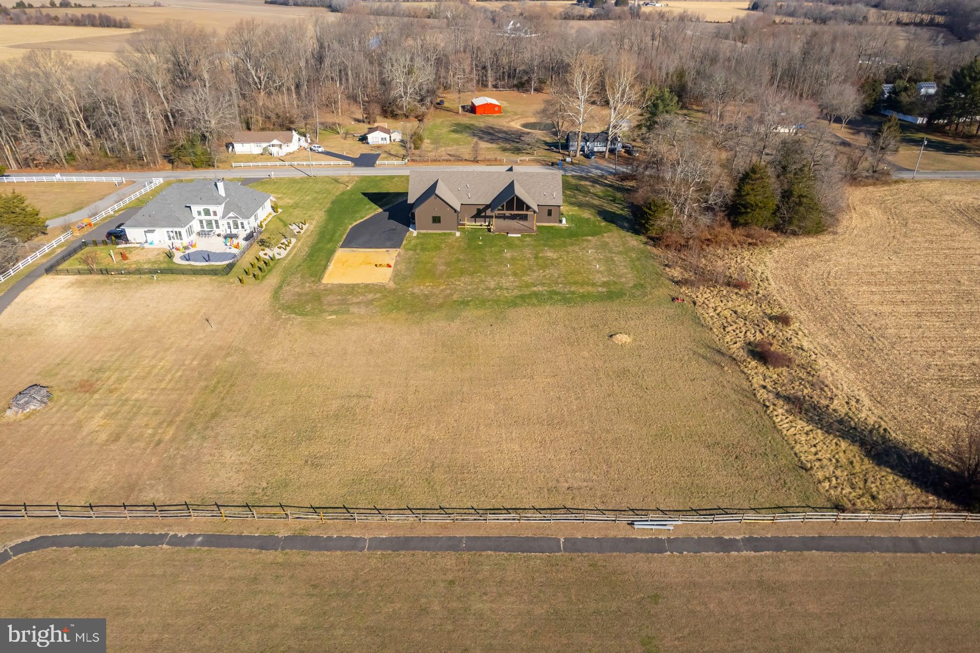 75 Ferrell Road Mullica Hill, NJ 08062 - Photo 42 of 42 a view of a swimming pool with an outdoor seating and yard