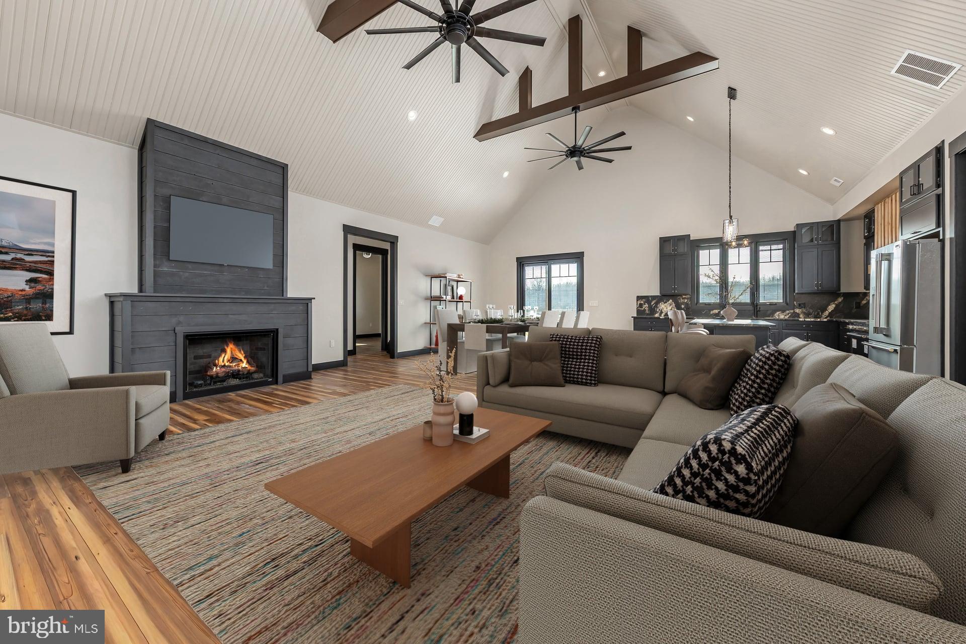 75 Ferrell Road Mullica Hill, NJ 08062 - Photo 6 of 42 a living room with furniture and a fireplace