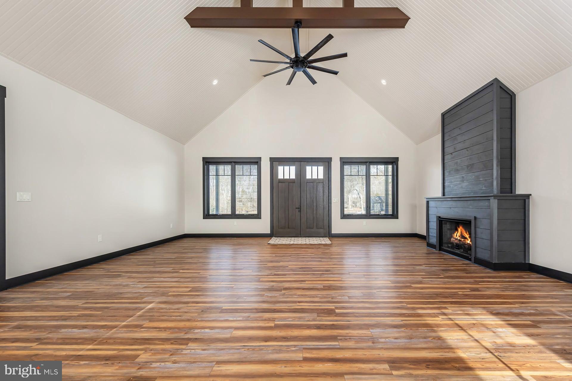 75 Ferrell Road Mullica Hill, NJ 08062 - Photo 8 of 42 a view of an empty room with window and fireplace