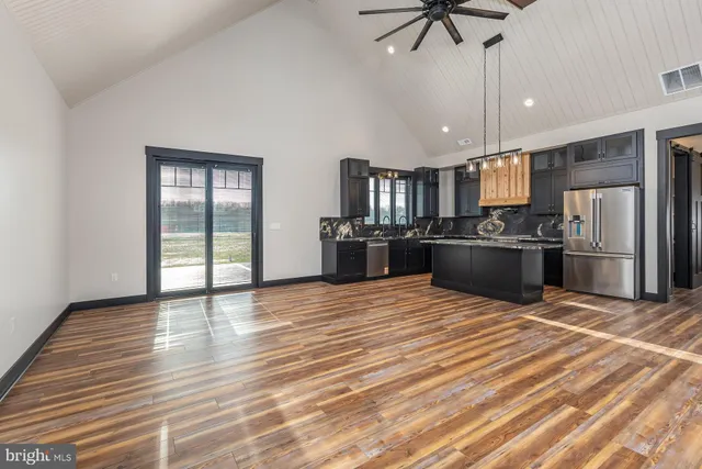 wooden floor and kitchen view