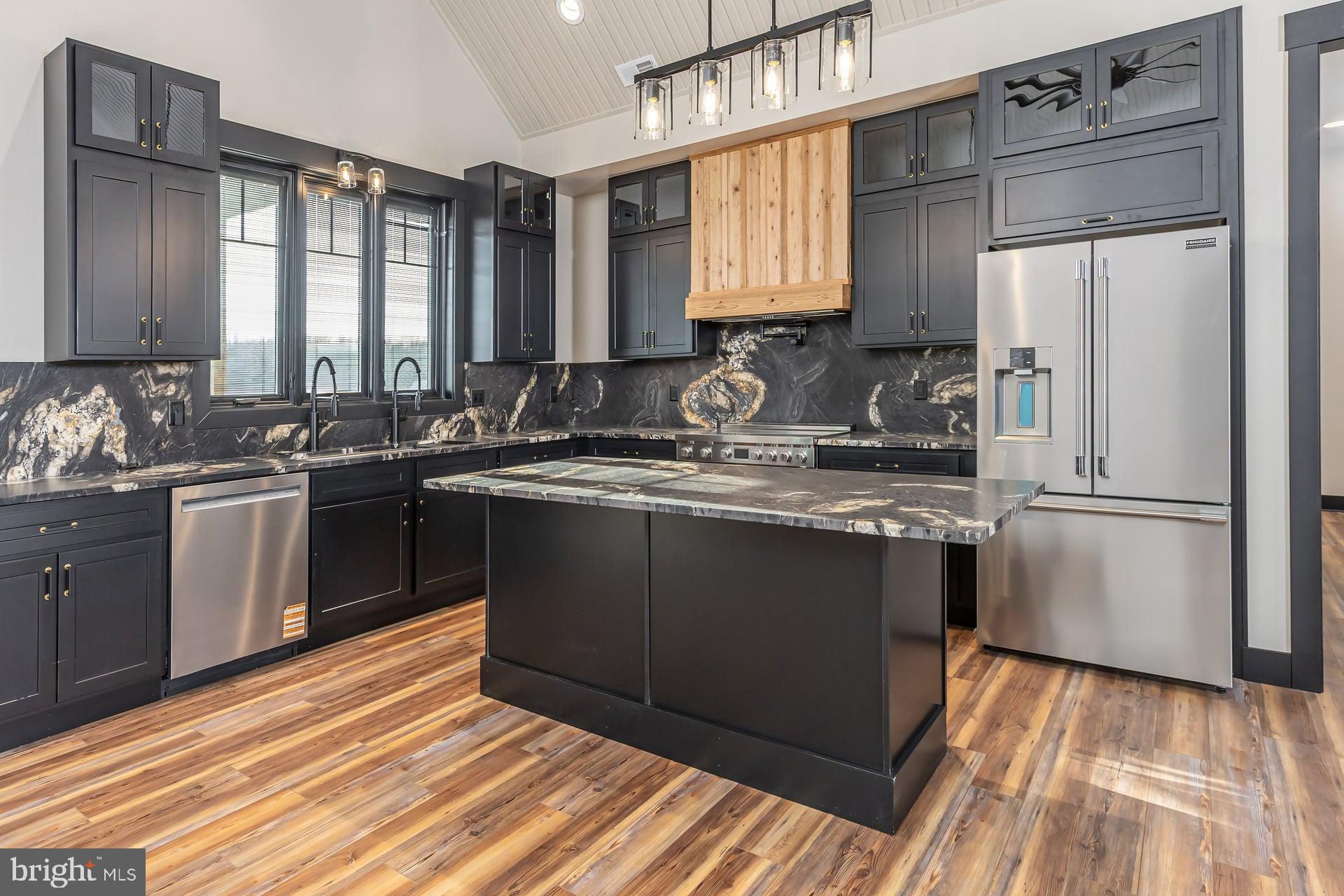 75 Ferrell Road Mullica Hill, NJ 08062 - Photo 10 of 42 a kitchen with a sink stove and refrigerator