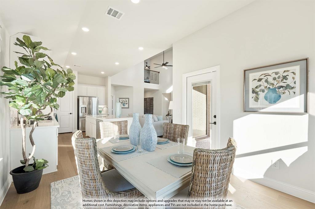 5845 Anning Way Pilot Point, TX 76258 - Photo 19 of 39 a living room with furniture and a potted plant