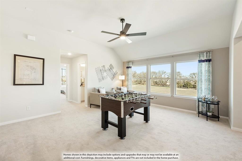 5845 Anning Way Pilot Point, TX 76258 - Photo 28 of 39 a living room with furniture a large window and a rug