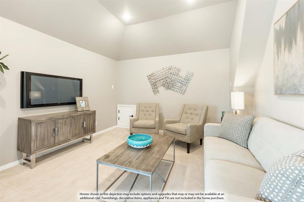 5845 Anning Way Pilot Point, TX 76258 - Photo 33 of 39 a living room with furniture and a flat screen tv