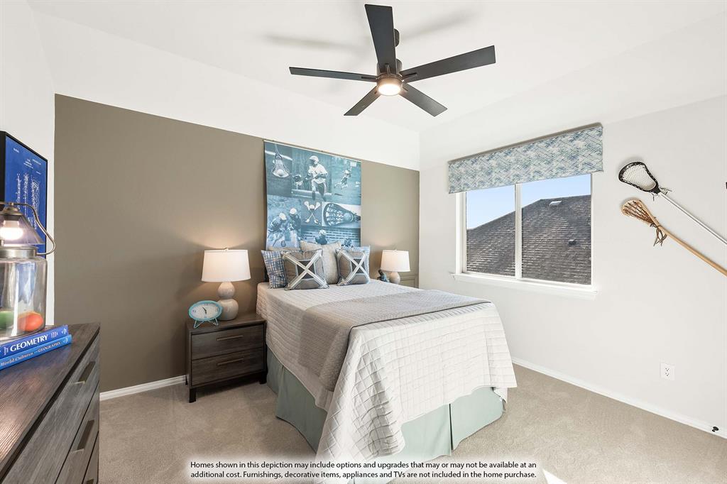 5845 Anning Way Pilot Point, TX 76258 - Photo 39 of 39 a bedroom with a bed and a ceiling fan