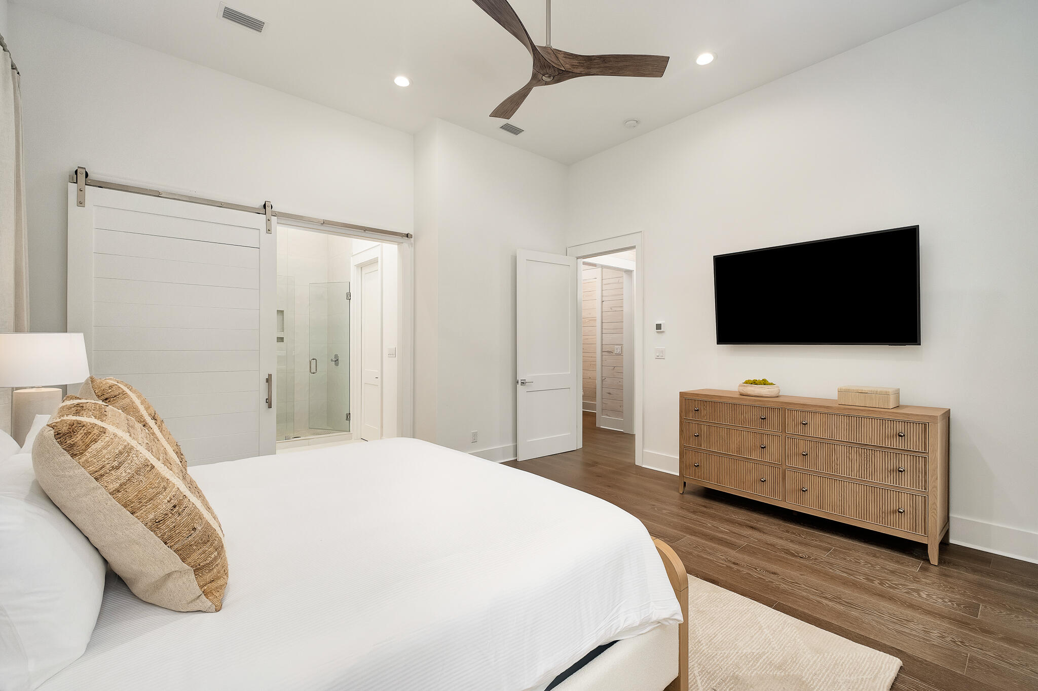 65 South Gulf Drive Santa Rosa Beach, FL 32459 - Photo 14 of 42 a bedroom with a bed and a flat screen tv