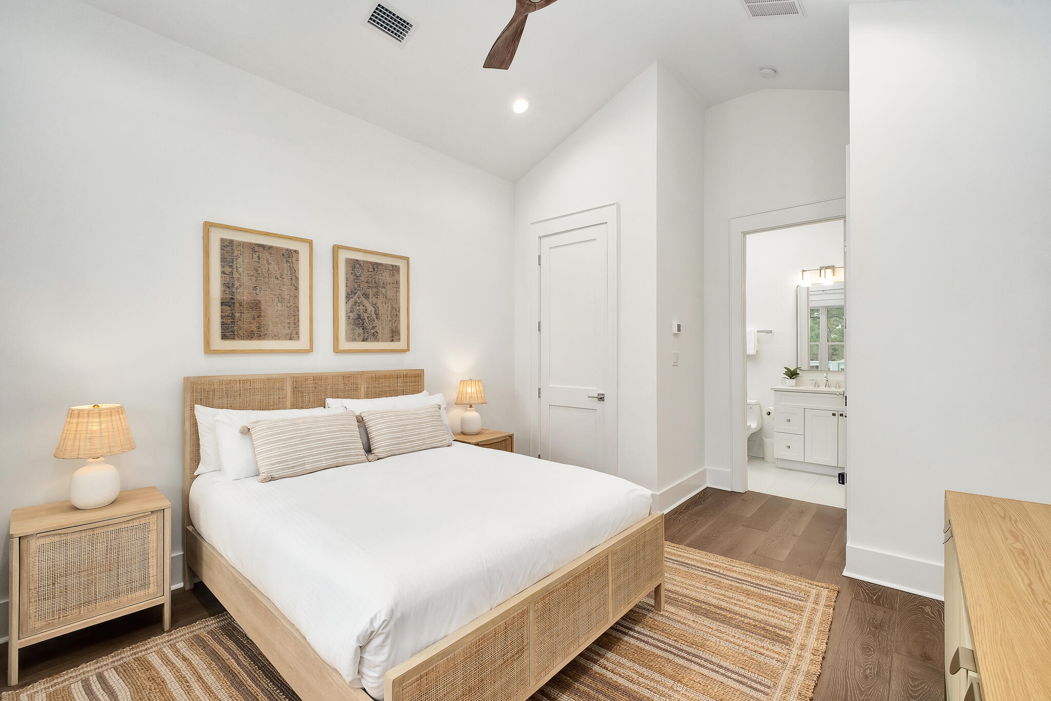 65 South Gulf Drive Santa Rosa Beach, FL 32459 - Photo 18 of 42 a bedroom with a bed and painting on the wall