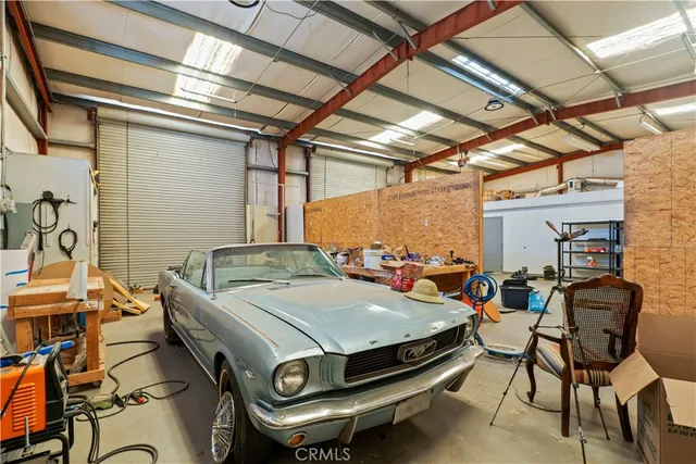 a view of an empty room with closet