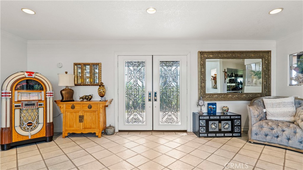 17850 Vista Del Lago Drive Riverside, CA 92503 - Photo 4 of 47 a bedroom with furniture and a window