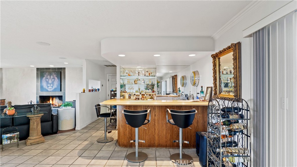 17850 Vista Del Lago Drive Riverside, CA 92503 - Photo 7 of 47 a kitchen with stainless steel appliances granite countertop a sink and cabinets