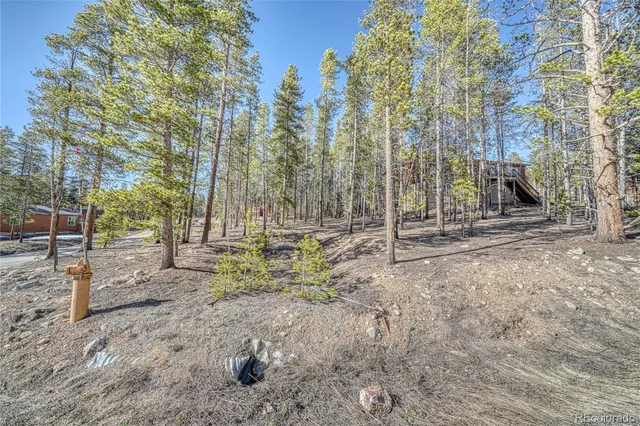 a view of a brick building next to a road