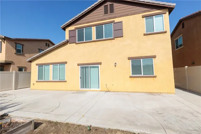 a front view of a house having yard