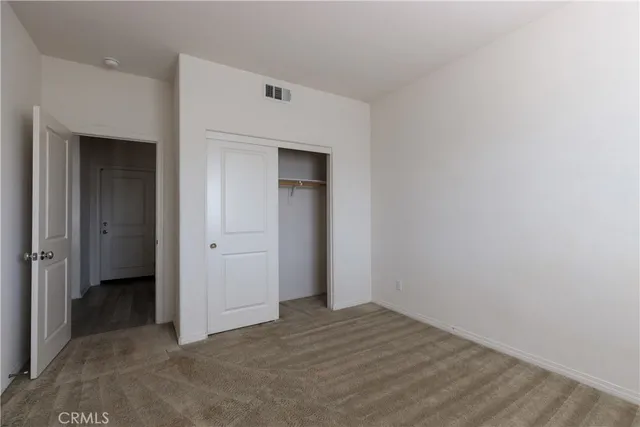 an empty room with closet