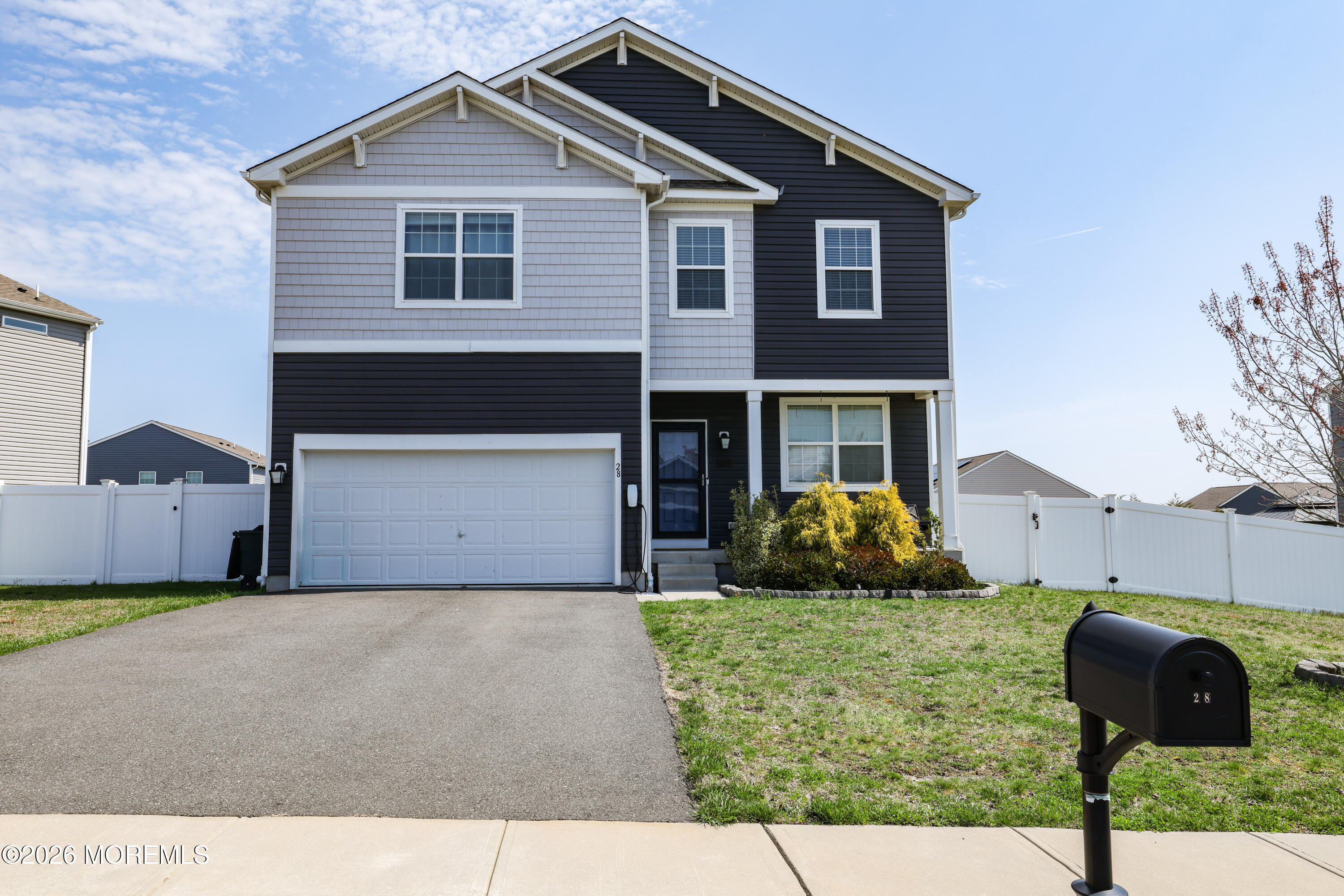 28 Dylan Boulevard Barnegat, NJ 08005 - Photo 1 of 51 a front view of a house with garden