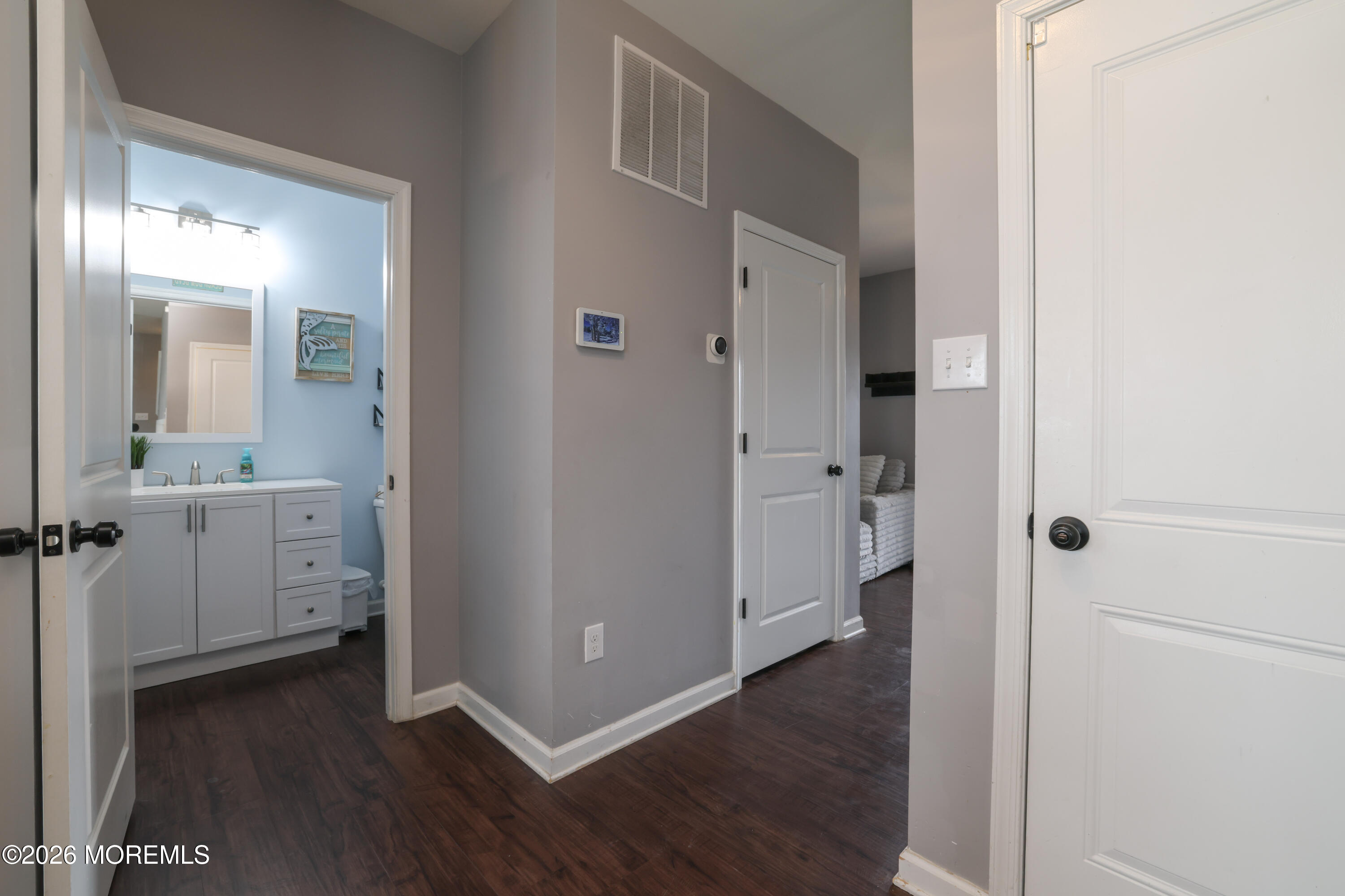 28 Dylan Boulevard Barnegat, NJ 08005 - Photo 11 of 51 a bathroom with a sink and a mirror