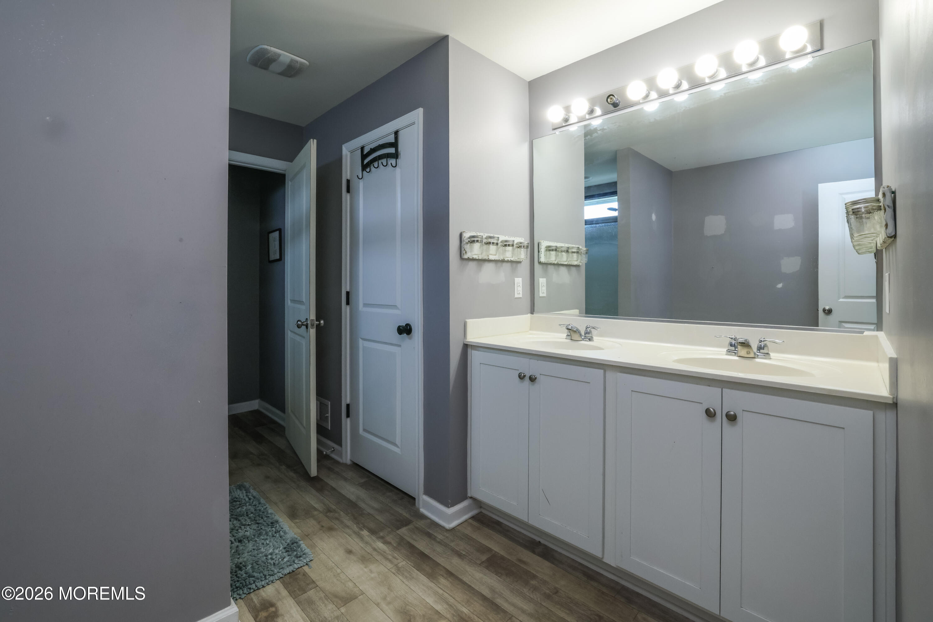 28 Dylan Boulevard Barnegat, NJ 08005 - Photo 30 of 51 a bathroom with a double vanity sink and a mirror