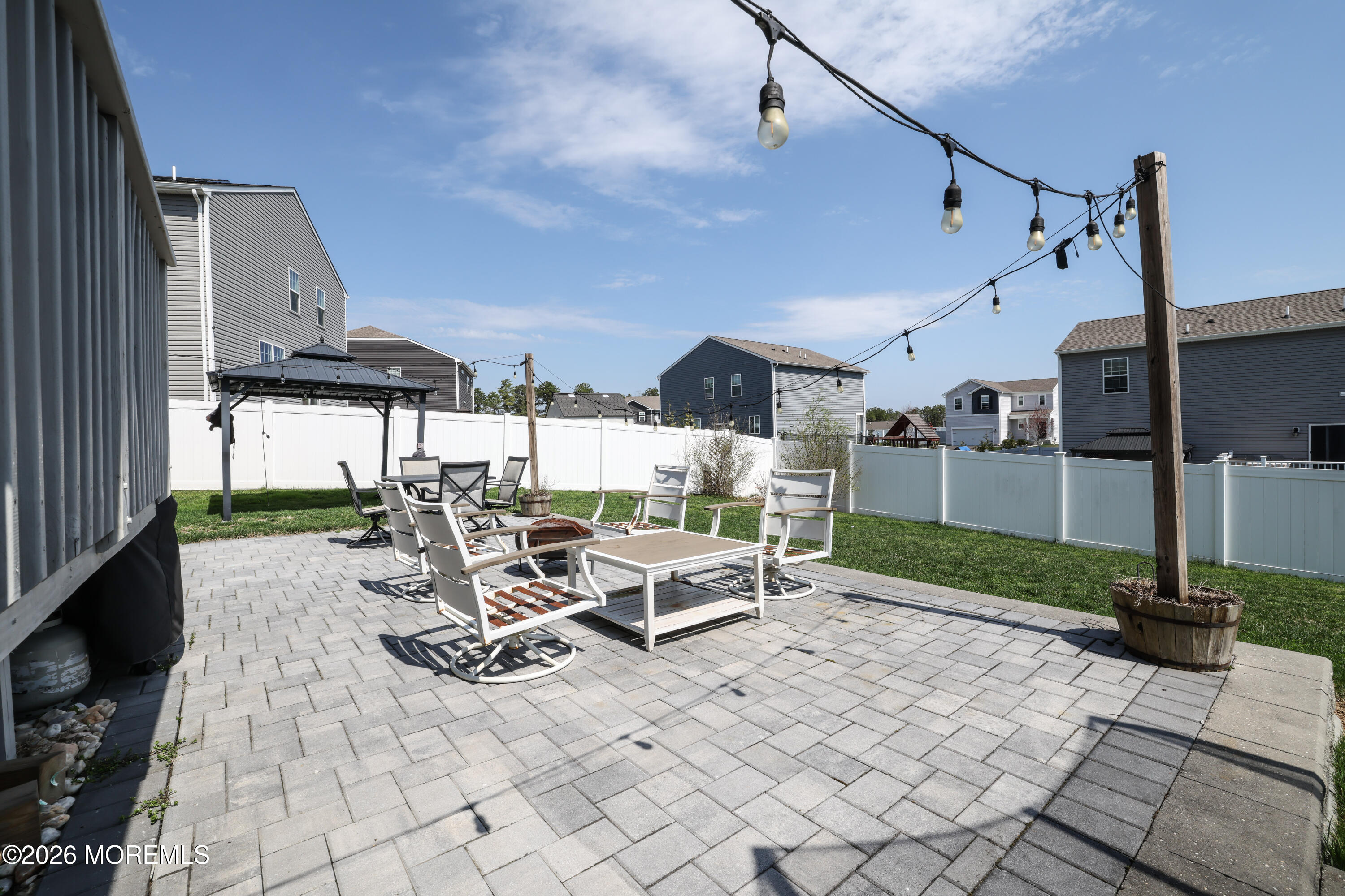 28 Dylan Boulevard Barnegat, NJ 08005 - Photo 51 of 51 a view of a patio with a table chairs and a yard