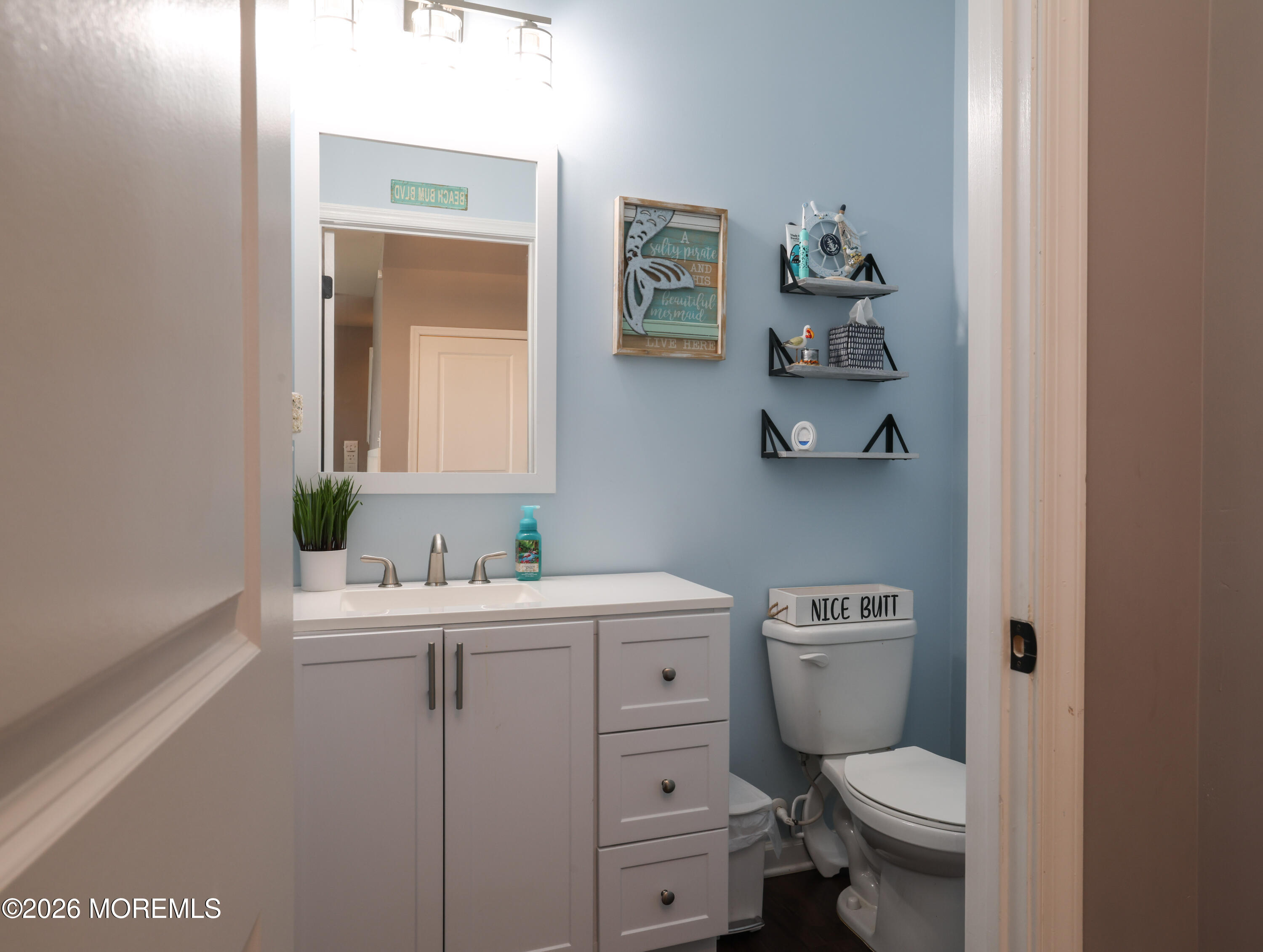 28 Dylan Boulevard Barnegat, NJ 08005 - Photo 10 of 51 a bathroom with a toilet a sink and a window