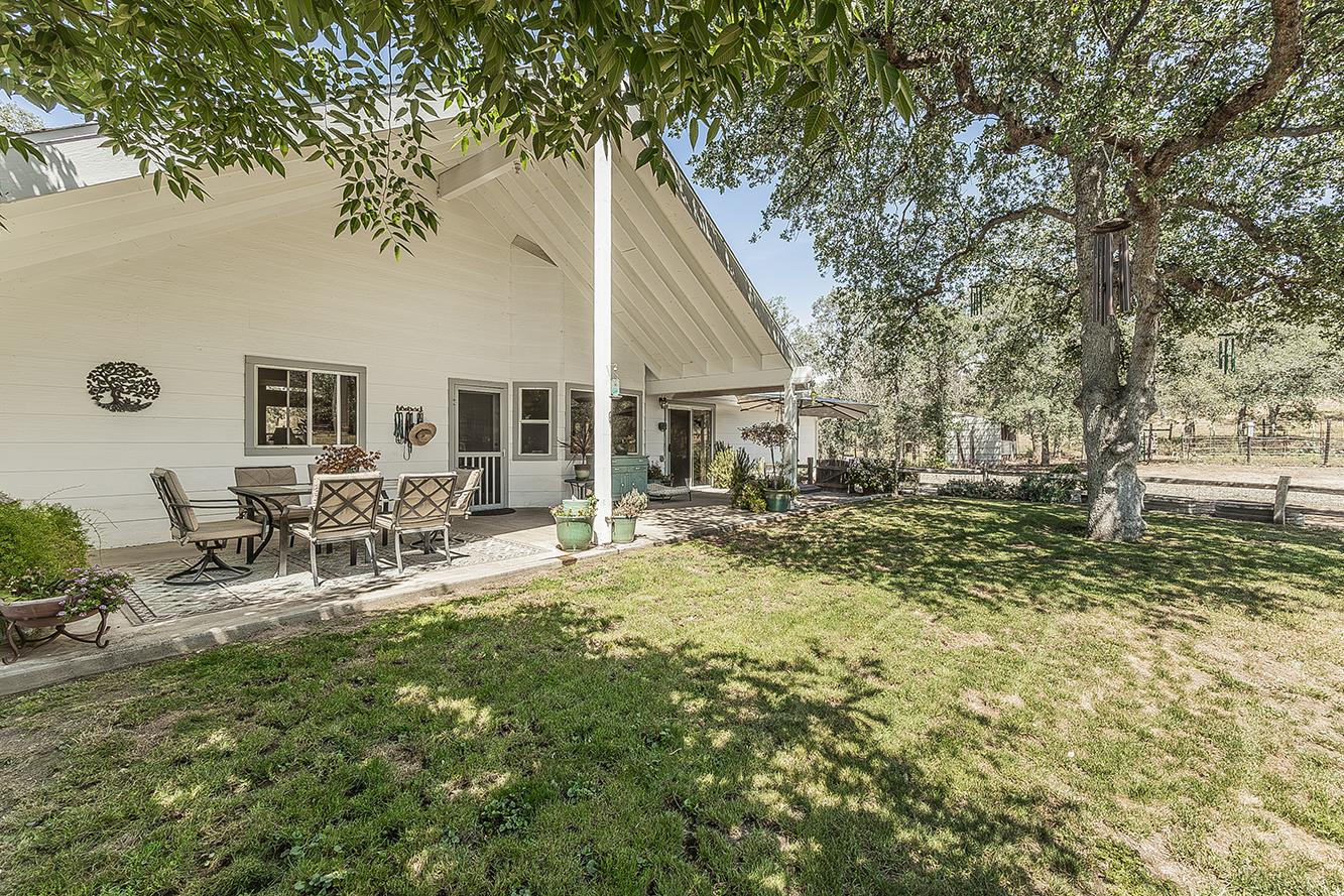 14815 Garlock Lane Prather, CA 93651 - Photo 35 of 80 a view of a house with backyard porch and sitting area