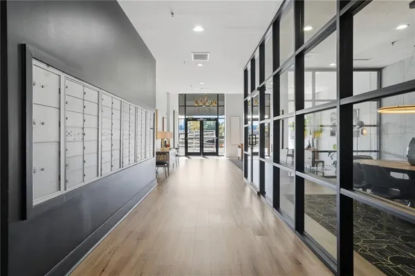 a view of gallery with wooden floor