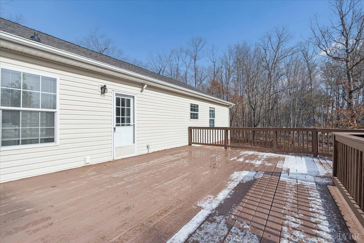 6124 Old Courthouse Road Appomattox, VA 24522 - Photo 37 of 52 a view of house with wooden floor and large trees