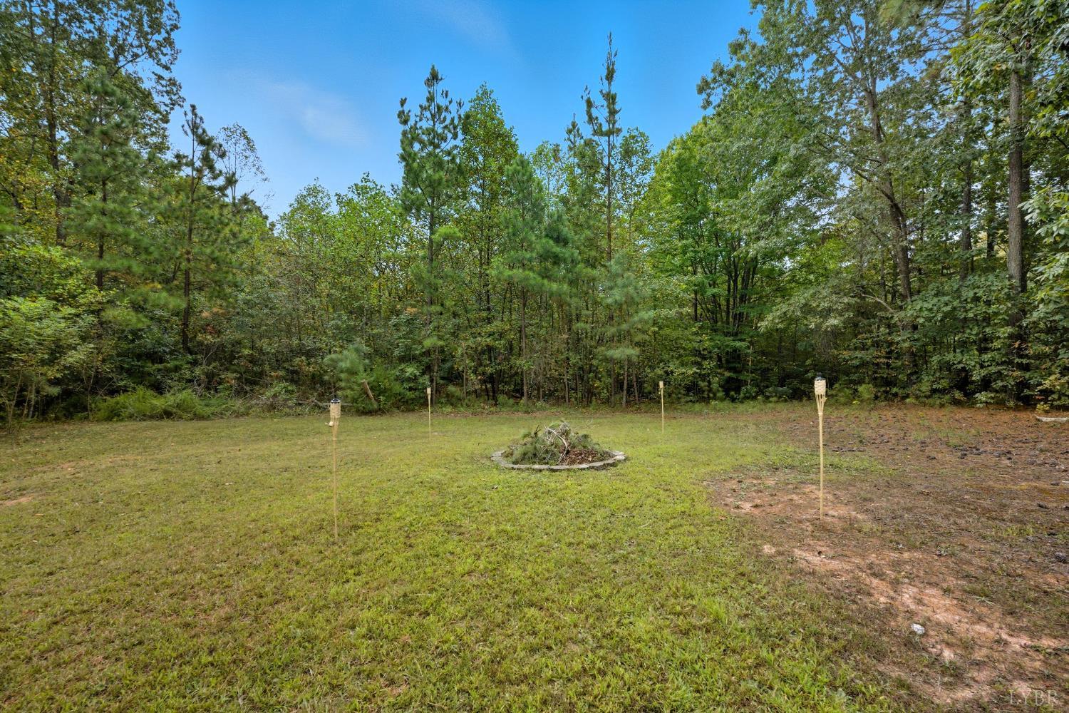 6124 Old Courthouse Road Appomattox, VA 24522 - Photo 39 of 52 a backyard of a house with lots of green space