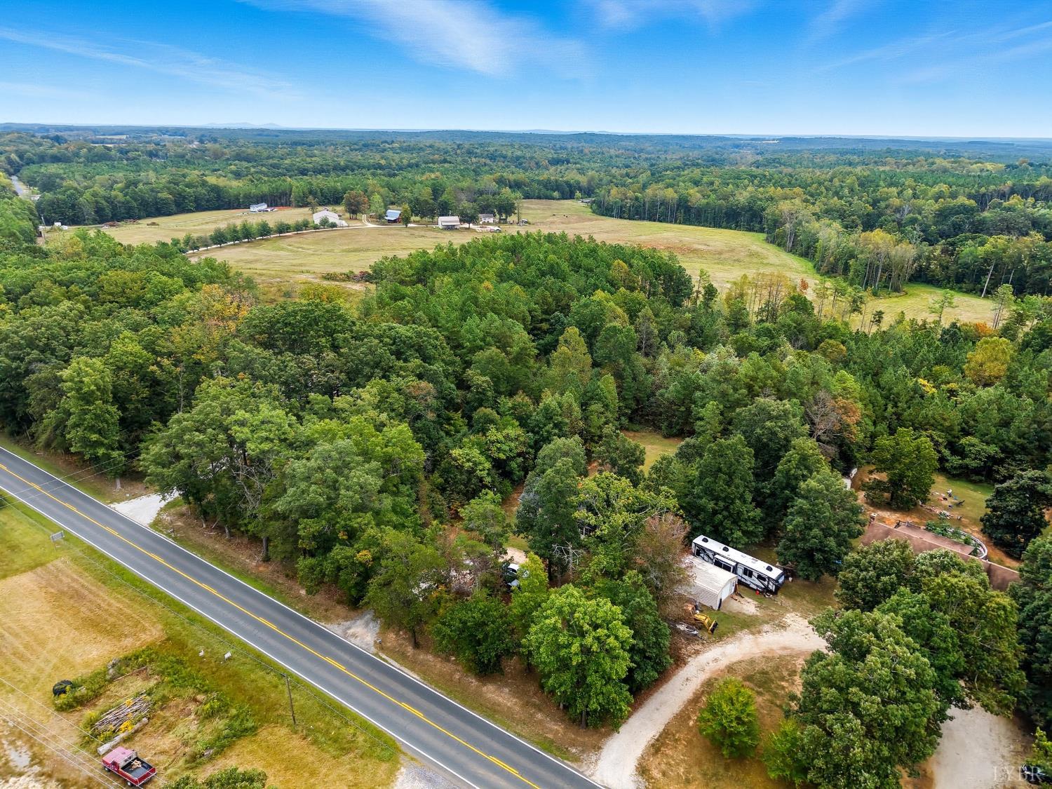 6124 Old Courthouse Road Appomattox, VA 24522 - Photo 45 of 52 an aerial view of lake and residential houses with outdoor space and trees