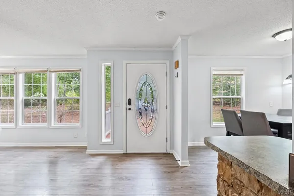 a view of livingroom with furniture wooden floor and window
