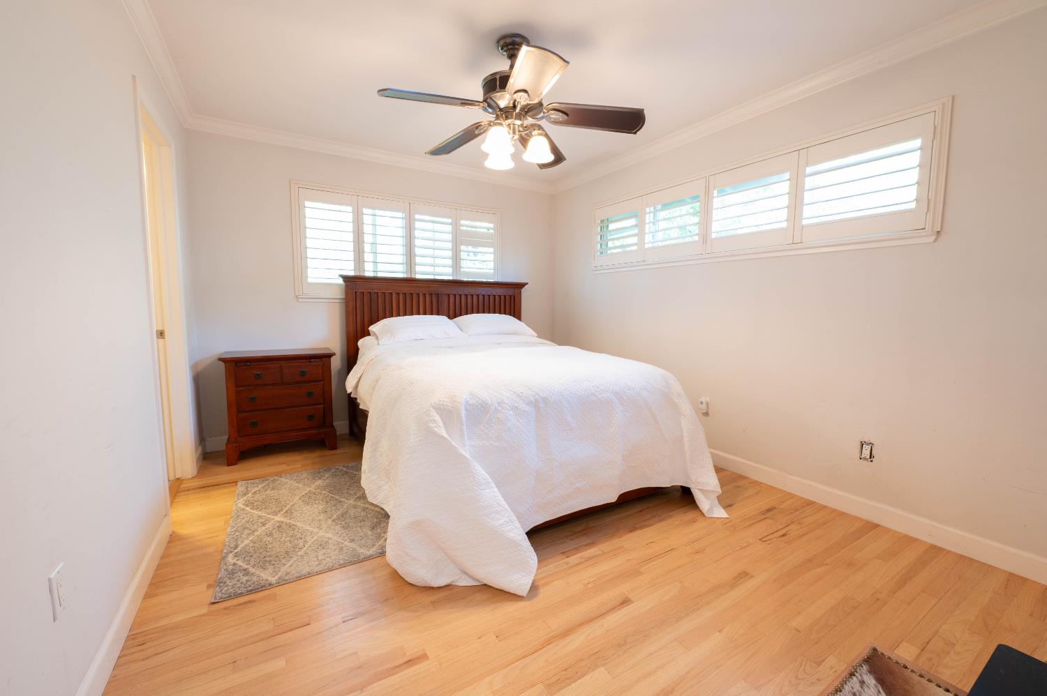 4530 Bela Way Carmichael, CA 95608 - Photo 14 of 36 Bright primary bedroom with walk-in closet and en suite bathroom.