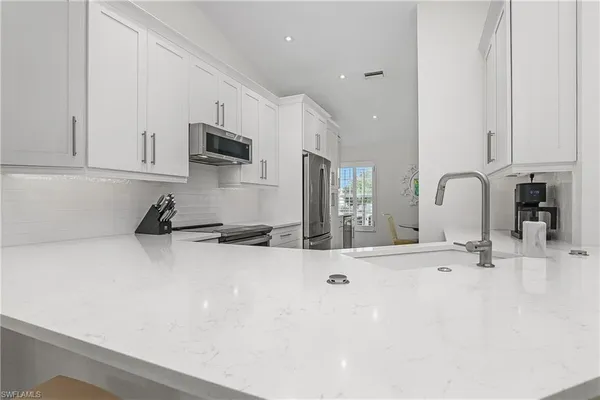 $10,000 | 853 Tanbark Drive, Unit 201, Naples, FL 34108