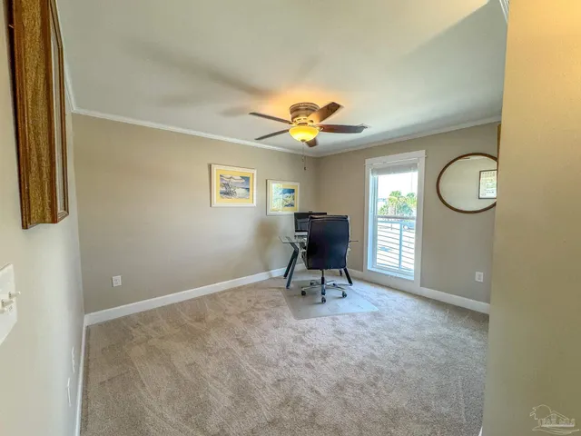 a view of a street with a building in the background
