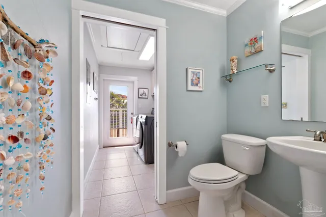 an aerial view of residential building and ocean