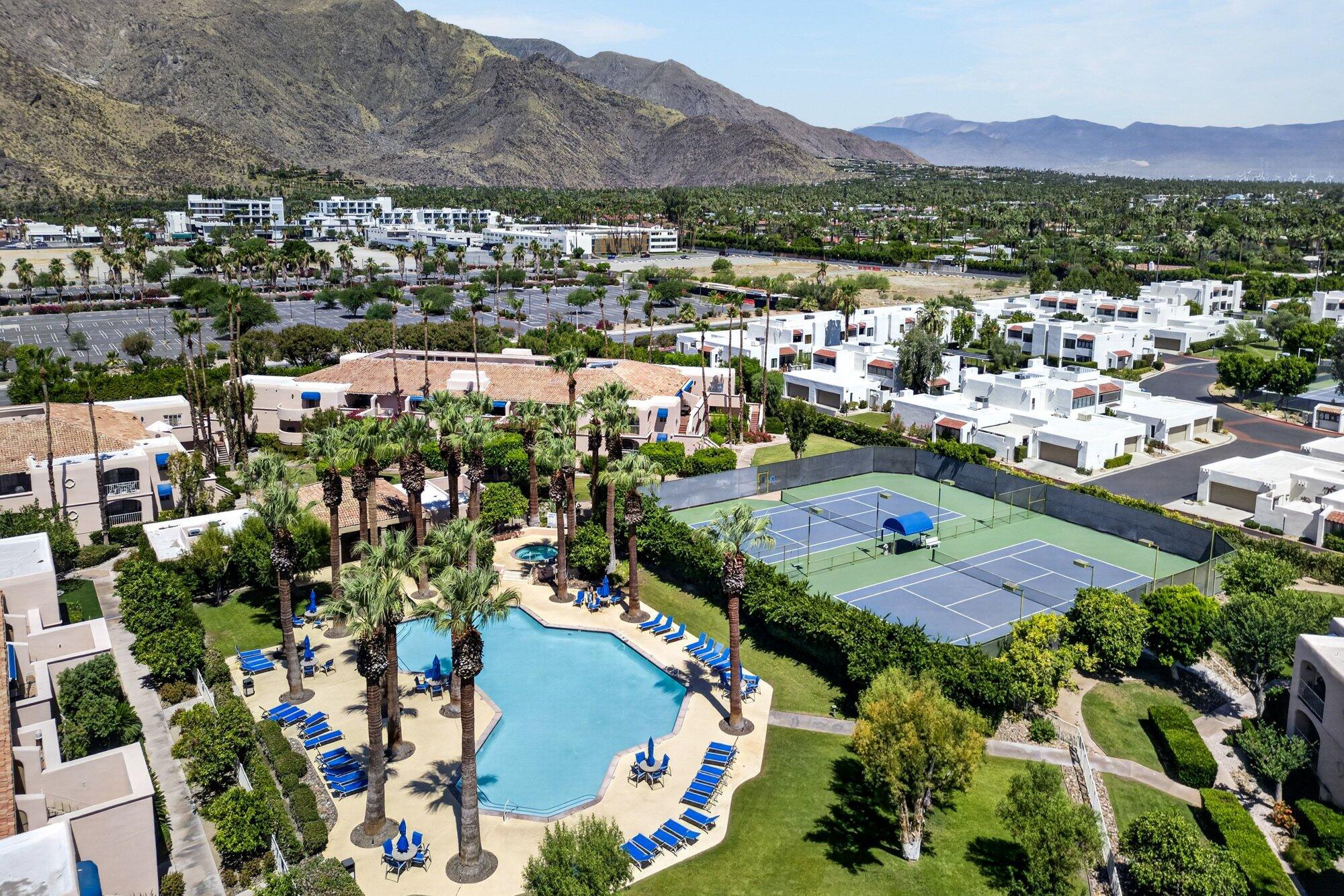 500 East Amado Road, Unit 313 Palm Springs, CA 92262 - Photo 27 of 32 an aerial view of residential houses and outdoor space
