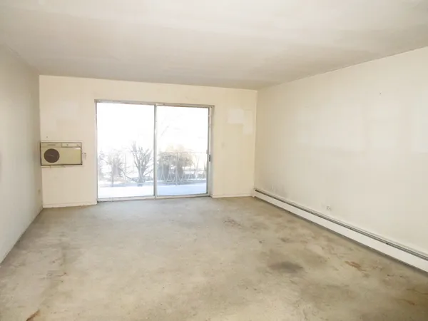 an empty room with windows