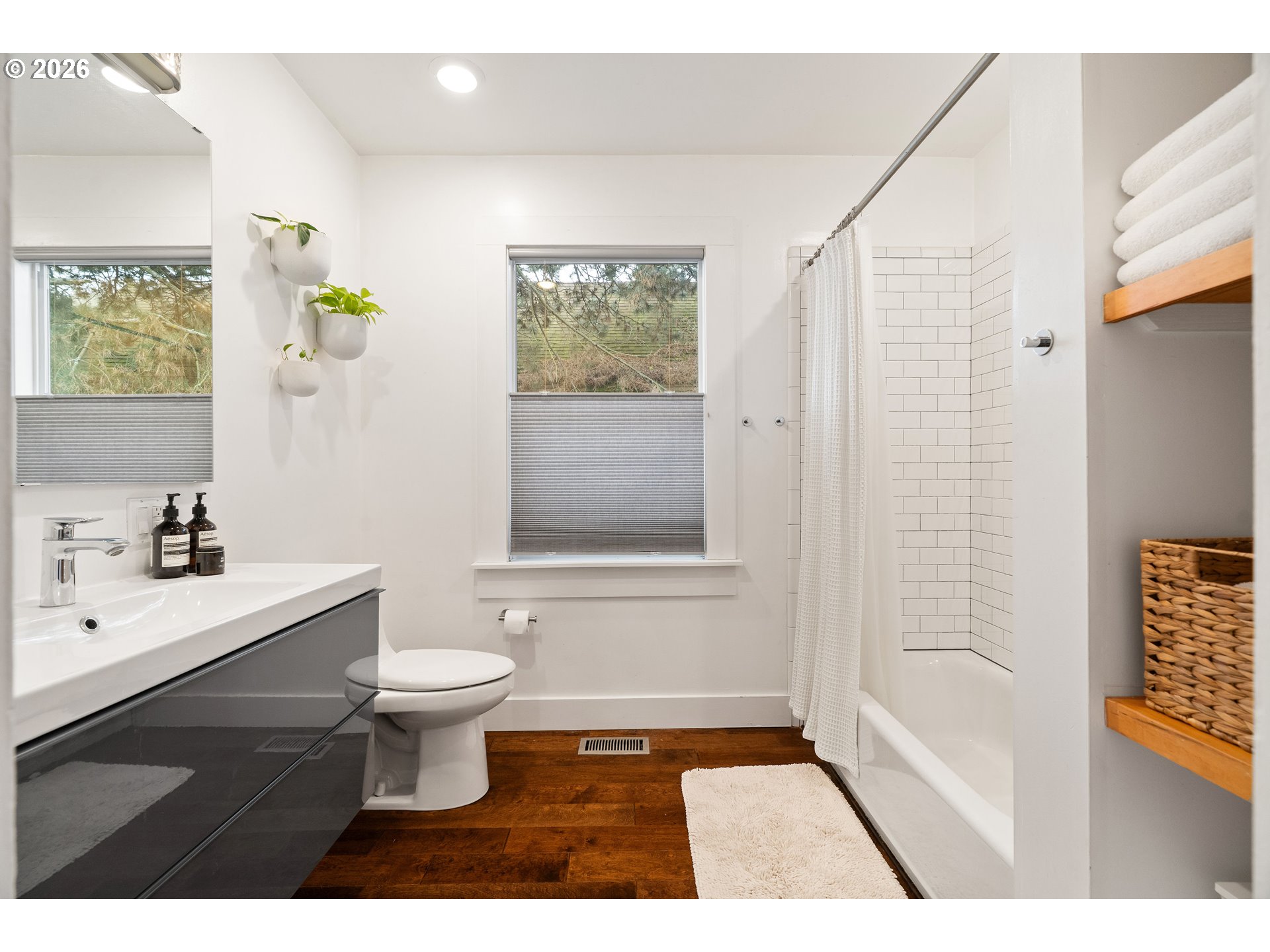 3017 South Water Avenue Portland, OR 97201 - Photo 16 of 31 a bathroom with a sink a toilet and shower