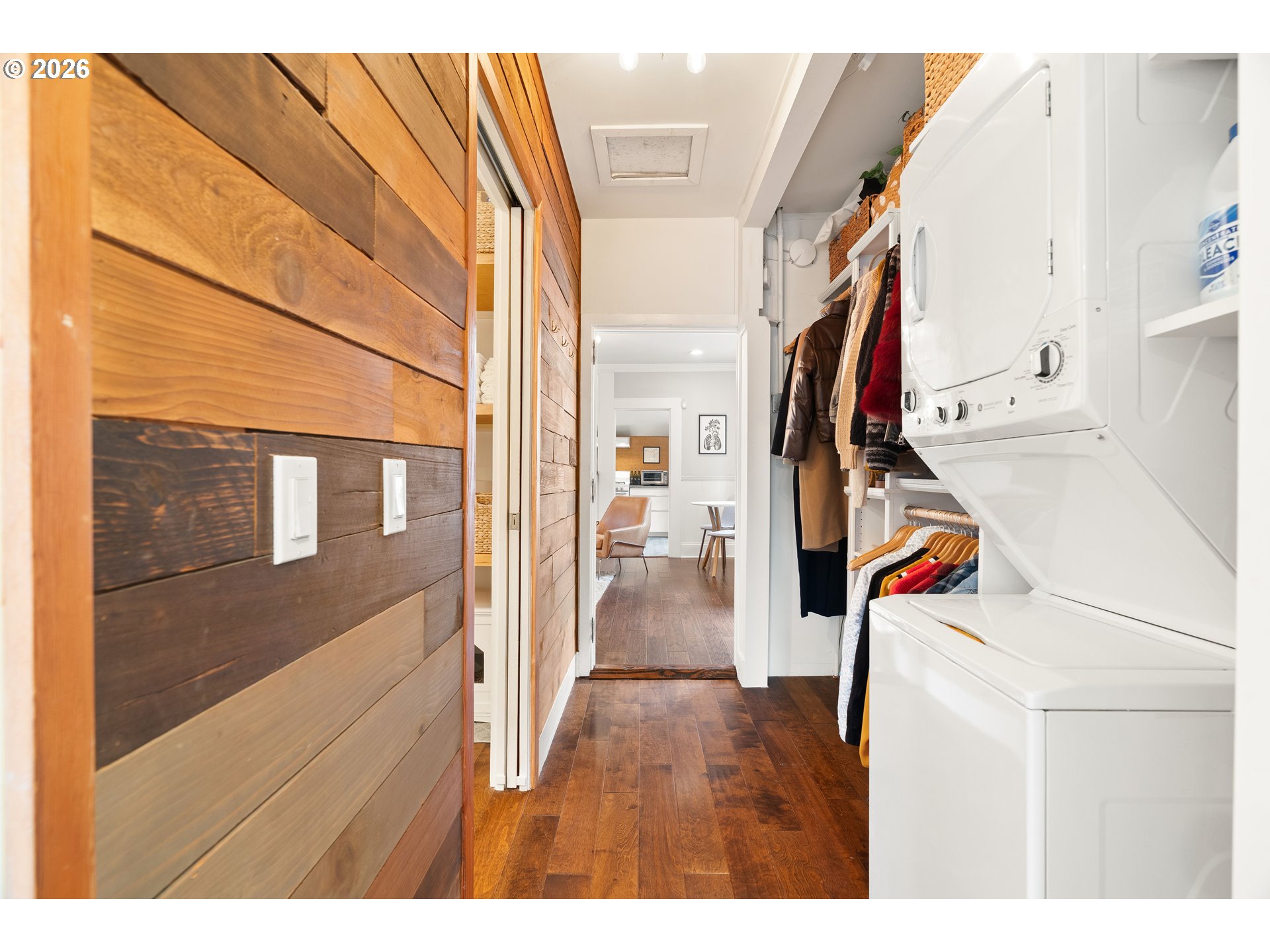 3017 South Water Avenue Portland, OR 97201 - Photo 20 of 31 a view of a hallway with a white house and wooden floor