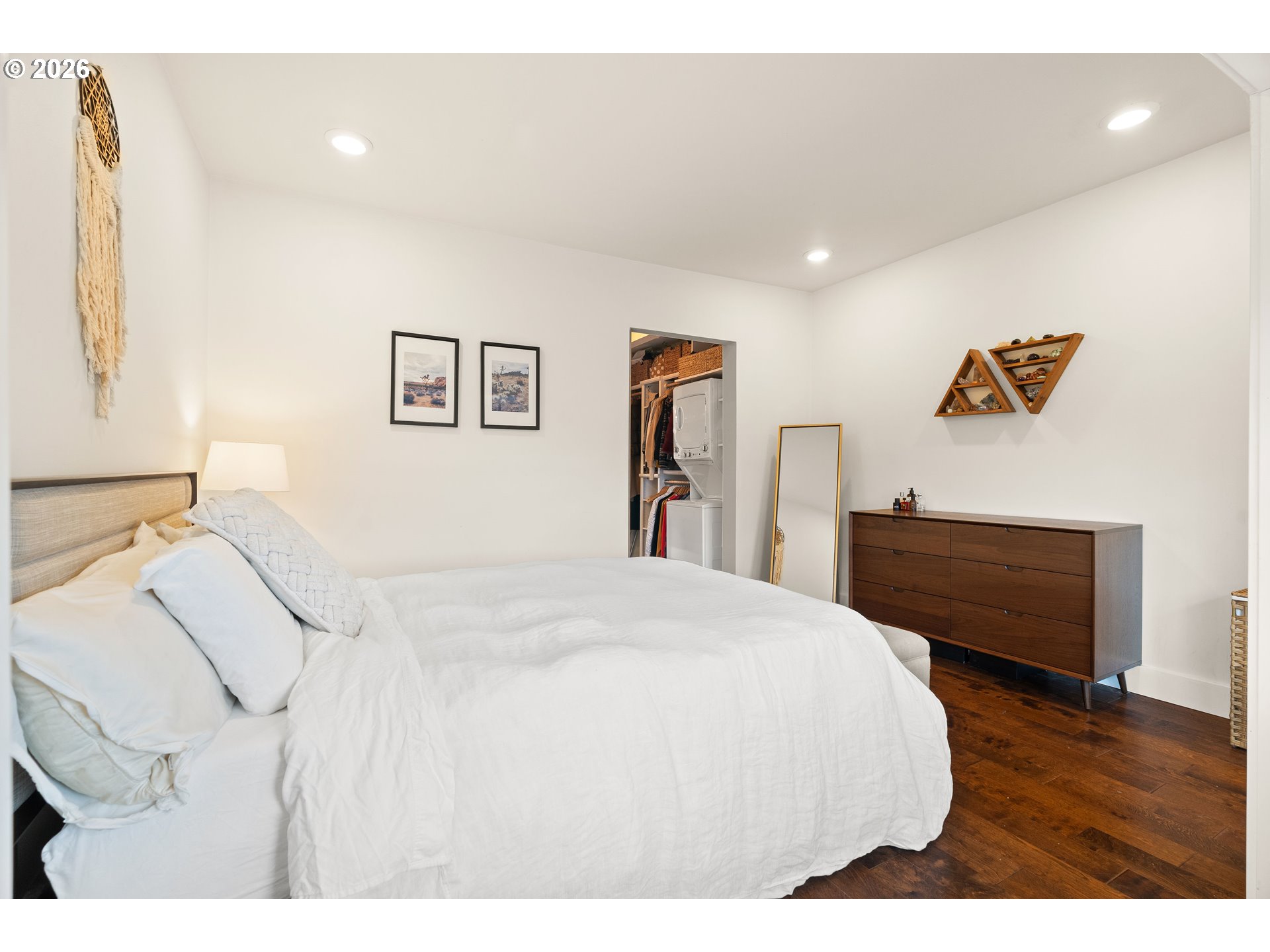 3017 South Water Avenue Portland, OR 97201 - Photo 23 of 31 a bedroom with a bed and wooden floor