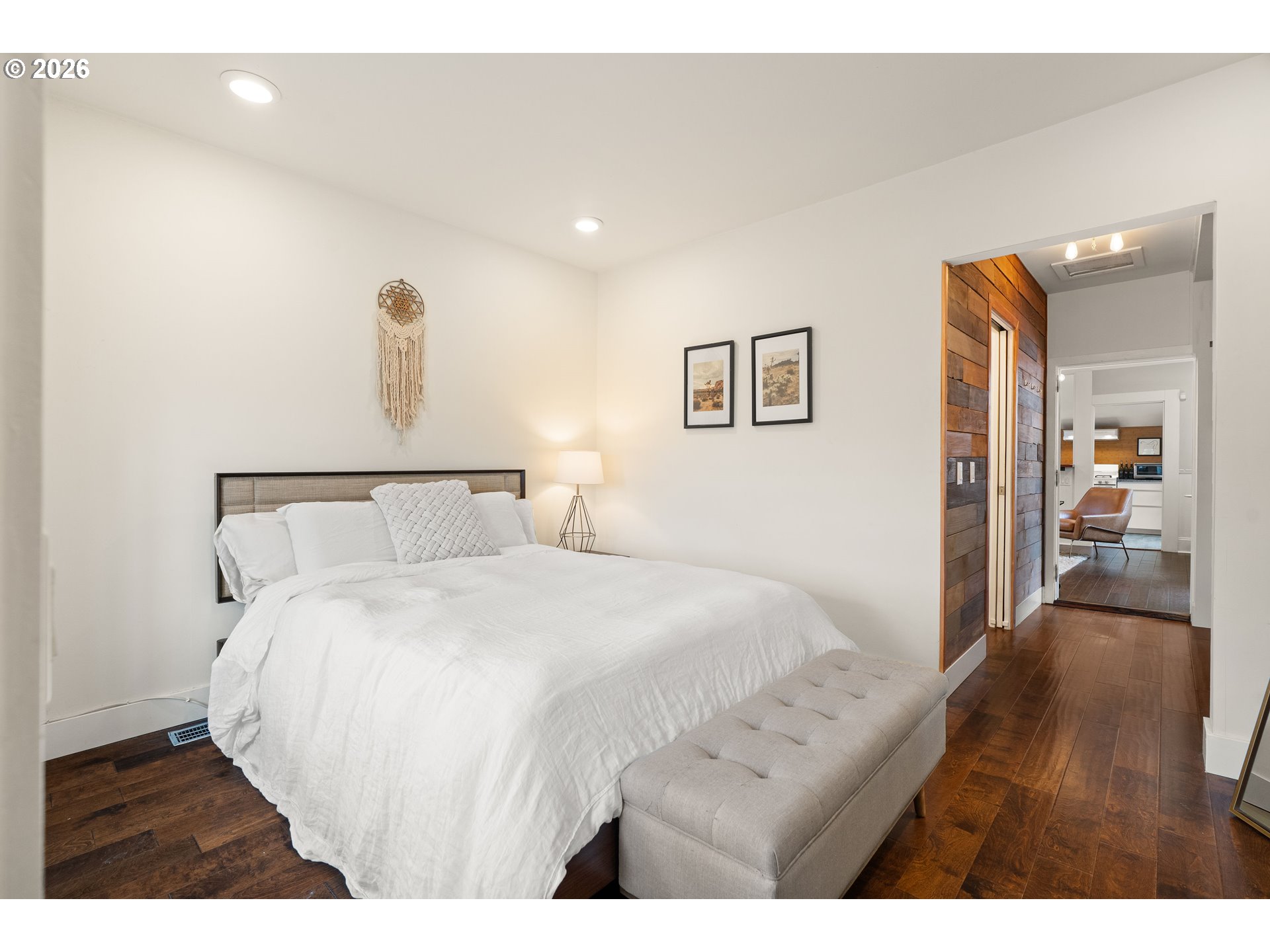 3017 South Water Avenue Portland, OR 97201 - Photo 26 of 31 a bedroom with a bed and a view of bathroom
