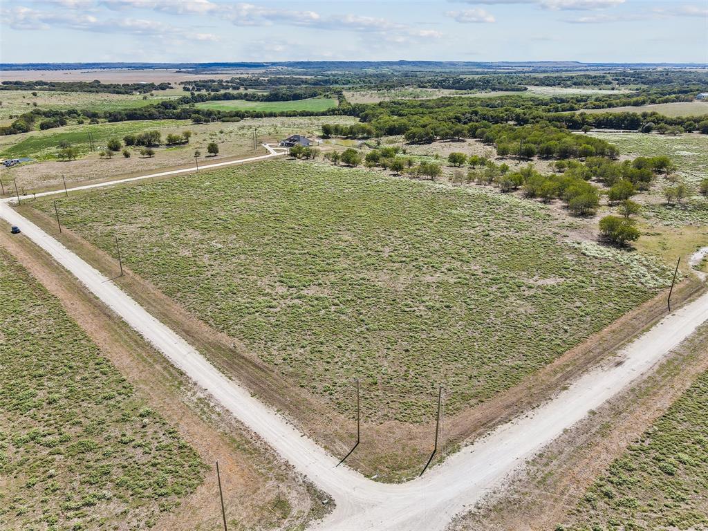 450 Private Road 453 Road, Unit LOT 12 Grandview, TX 76050 - Photo 4 of 15 Birds eye view of property featuring a rural view