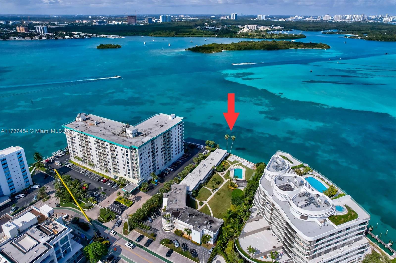 1155 103rd Street, Unit 9B Bay Harbor Islands, FL 33154 - Photo 31 of 43 an aerial view of a house with outdoor space lake view and mountain view