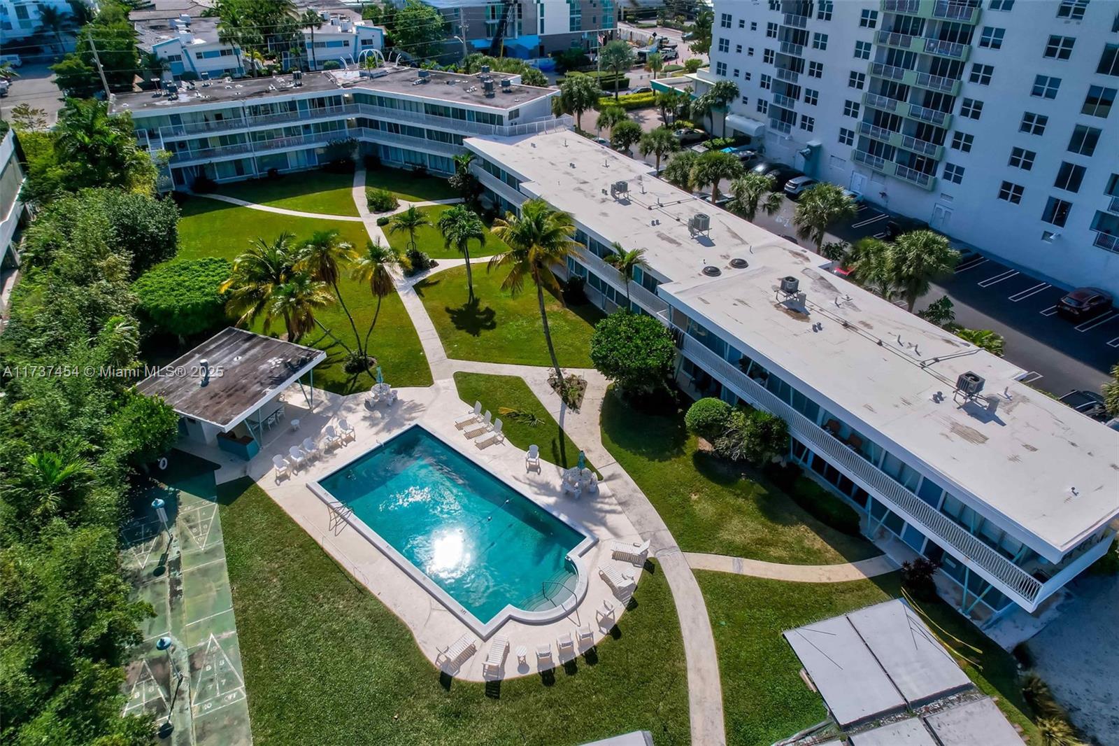 1155 103rd Street, Unit 9B Bay Harbor Islands, FL 33154 - Photo 39 of 43 an aerial view of swimming pool