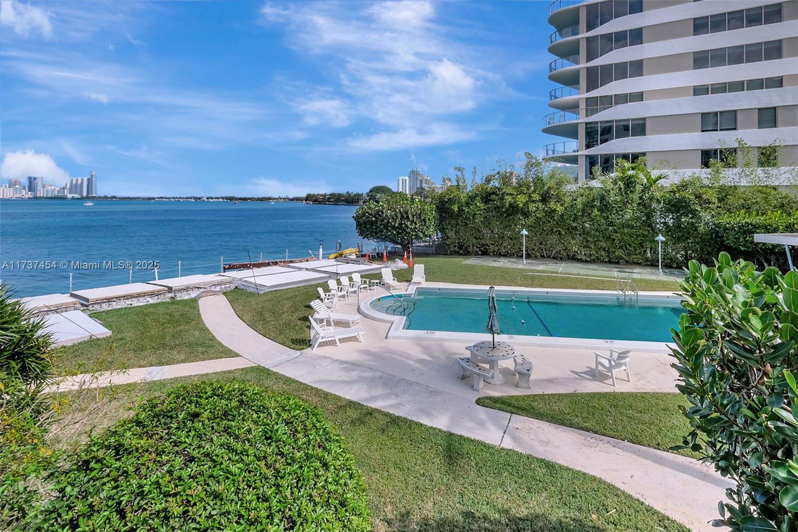 1155 103rd Street, Unit 9B Bay Harbor Islands, FL 33154 - Photo 4 of 43 a view of a park with houses