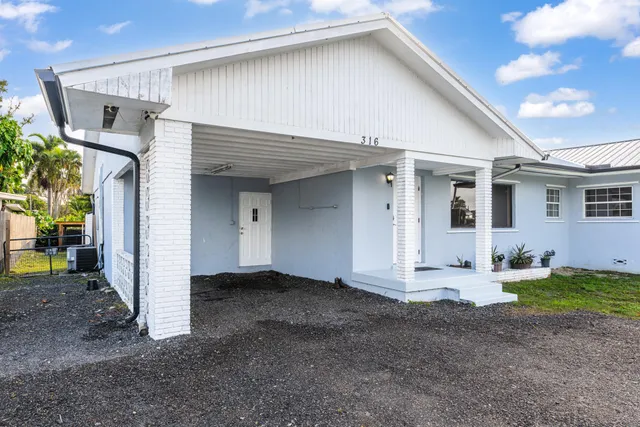 a view of a house with patio