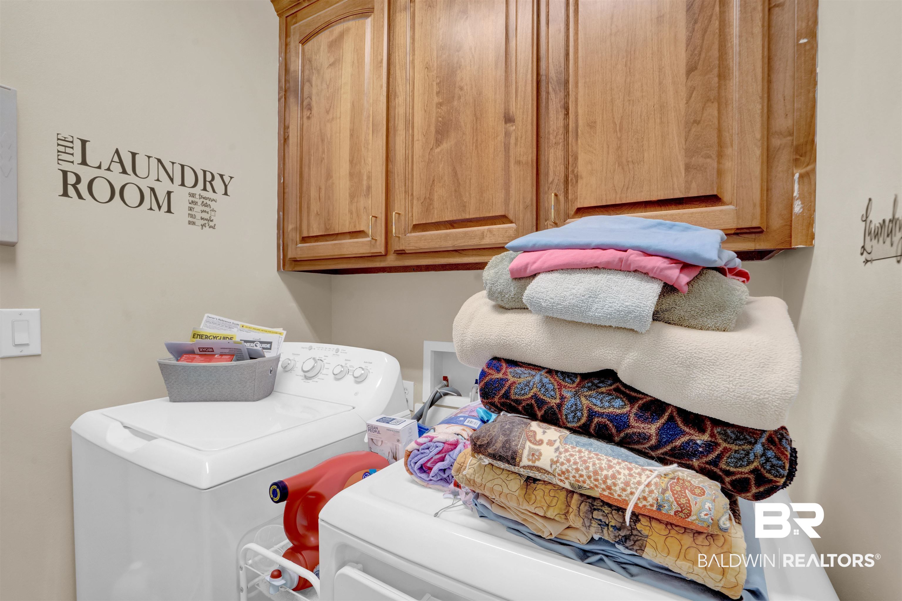 10951 Driver Court Fairhope, AL 36532 - Photo 31 of 46 Washroom featuring washing machine and clothes dryer and cabinets