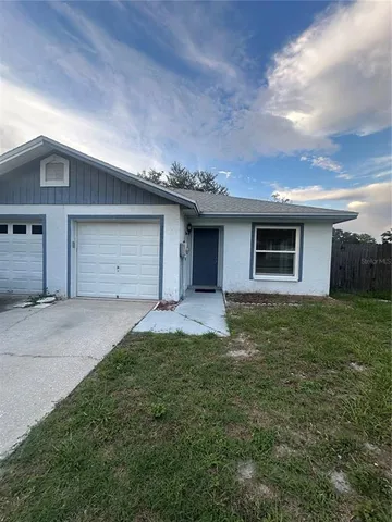 a house view with a garden space