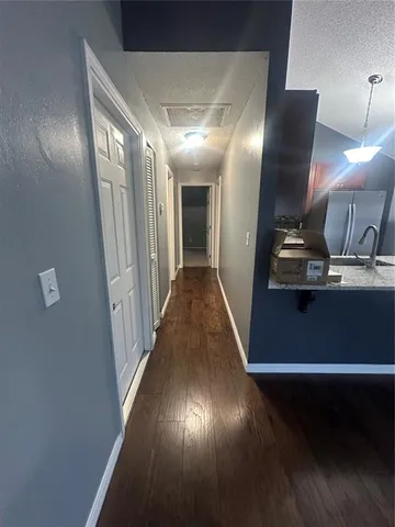 a view of a hallway with entryway
