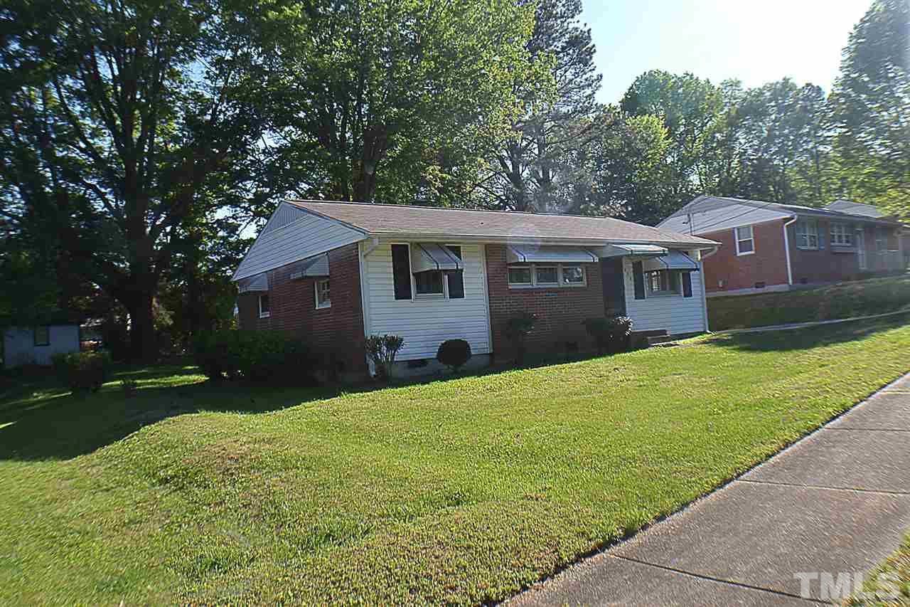 856 Hadley Road Raleigh, NC 27610 - Photo 12 of 13 a front view of a house with a yard