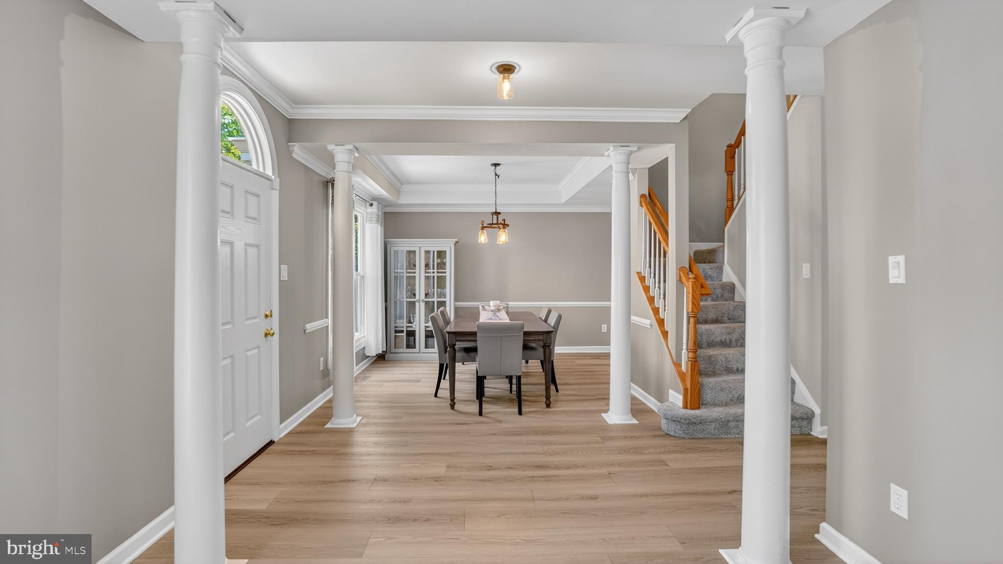 2812 Brite Court Crofton, MD 21114 - Photo 11 of 55 a view of a dining room with furniture window and wooden floor